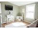 This bedroom features a vanity and mounted TV at 3991 Bunker Hill School Rd, Claremont, NC 28610