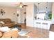 Cozy living room featuring hardwood floors, modern decor, and a comfortable seating area at 3991 Bunker Hill School Rd, Claremont, NC 28610