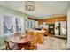 Bright kitchen with tile floors, wooden cabinets, and a cozy breakfast nook at 401 N Inman Ave, Bessemer City, NC 28016