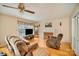 Inviting living room boasts hardwood floors, a cozy fireplace, and a large window at 401 N Inman Ave, Bessemer City, NC 28016