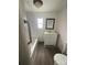A functional bathroom features a single sink vanity and tub at 412 Sumter St # A, Clover, SC 29710