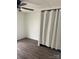 Bedroom featuring modern flooring, a ceiling fan, and natural light with closet at 412 Sumter St # A, Clover, SC 29710