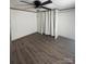 Bedroom featuring a ceiling fan, good natural light and modern flooring at 412 Sumter St # A, Clover, SC 29710