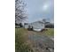 Charming single-story home features a gravel driveway and well-maintained lawn at 412 Sumter St # A, Clover, SC 29710