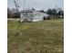 Single-story home with neutral siding and a small back deck area at 412 Sumter St # A, Clover, SC 29710