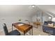 Bright bonus room has a desk and comfy chair, perfect for a home office at 4405 Zee Ct, Monroe, NC 28110
