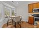 Cozy kitchen nook with a bay window, perfect for casual dining and enjoying the view at 4405 Zee Ct, Monroe, NC 28110