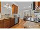 Charming kitchen with granite countertops, stainless steel appliances, and hardwood floors at 4405 Zee Ct, Monroe, NC 28110