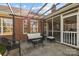 Relax on patio, perfect for outdoor gatherings, with a screened porch nearby at 4405 Zee Ct, Monroe, NC 28110