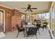 Enjoy outdoor living on screened porch, complete with a ceiling fan and privacy at 4405 Zee Ct, Monroe, NC 28110