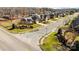 Street view displaying manicured lawns and beautiful homes in a quiet neighborhood with well-maintained landscaping at 4405 Zee Ct, Monroe, NC 28110