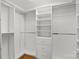 Spacious walk-in closet with built in shelving and racks at 4405 Zee Ct, Monroe, NC 28110