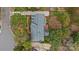 Overhead view of a house with mature landscaping, a gray roof, and a charming outdoor patio area at 4739 Binfords Ridge Rd, Charlotte, NC 28226