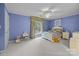 Brightly lit bedroom with a ceiling fan, carpet floors, and a sunny window at 4739 Binfords Ridge Rd, Charlotte, NC 28226