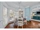 Bright breakfast nook featuring a round table, four chairs, and lots of natural light at 4739 Binfords Ridge Rd, Charlotte, NC 28226