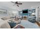 Comfortable living room with built-in shelves, fireplace, and plush seating at 4739 Binfords Ridge Rd, Charlotte, NC 28226