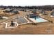 Aerial shot showcasing the community pool, playground, parking area, and neighborhood at 611 Yucatan Dr, Waxhaw, NC 28173