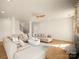 Bright living room with modern decor, hardwood floors, and a large sectional sofa is great for entertaining at 611 Yucatan Dr, Waxhaw, NC 28173