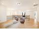 Open loft area with comfortable seating, soft rug, and hardwood floors at 611 Yucatan Dr, Waxhaw, NC 28173