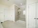 Glass enclosed walk-in shower in the home's modern and luxurious main bathroom at 611 Yucatan Dr, Waxhaw, NC 28173