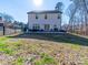 A spacious backyard featuring an outdoor patio with an outdoor grill and furniture at 1004 Loganberry Ln, Salisbury, NC 28146