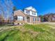 Charming brick home with black shutters and well-maintained landscaping at 1004 Loganberry Ln, Salisbury, NC 28146
