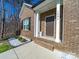 Attractive brick home entrance with white columns and fresh landscaping at 1004 Loganberry Ln, Salisbury, NC 28146