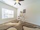 Bright living room with natural light, wood floors and stylish decor at 1004 Loganberry Ln, Salisbury, NC 28146