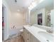 The main bathroom has a double vanity, a soaking tub, and a walk-in shower at 1004 Loganberry Ln, Salisbury, NC 28146