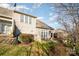 Spacious backyard with a patio area, surrounded by lush greenery and mature trees, perfect for relaxing outdoors at 10142 Linksland Dr, Huntersville, NC 28078