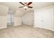 Bedroom with ceiling fan, closet, and window for natural light at 10142 Linksland Dr, Huntersville, NC 28078