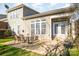Back of the house, featuring a patio area with outdoor seating for enjoying the backyard view at 10142 Linksland Dr, Huntersville, NC 28078