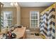 Neutral bathroom with patterned shower curtain and window at 1275 Rocky Ridge Trl, Salisbury, NC 28146