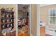 View of a bedroom through a doorway, showcasing a comfortable space with wood floors at 1275 Rocky Ridge Trl, Salisbury, NC 28146