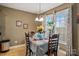 Cozy dining area with bright window and charming decor; perfect for intimate gatherings at 1275 Rocky Ridge Trl, Salisbury, NC 28146