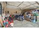 Garage with motorcycle and cluttered with many personal items at 1275 Rocky Ridge Trl, Salisbury, NC 28146