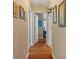 Hallway featuring hardwood floors and decorative art at 1275 Rocky Ridge Trl, Salisbury, NC 28146
