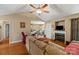 Bright living room featuring a fireplace, hardwood floors, and an open concept design at 1275 Rocky Ridge Trl, Salisbury, NC 28146