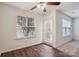 Bedroom features hardwood floors, a ceiling fan, and a sliding glass door for access outside at 1386 Walnut Hill Dr, Rock Hill, SC 29732