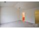 Airy bedroom with ceiling fan, carpet, access to the bathroom and walk-in closet at 1386 Walnut Hill Dr, Rock Hill, SC 29732