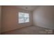 Cozy bedroom with neutral carpet, natural light from a window, and ample space at 1386 Walnut Hill Dr, Rock Hill, SC 29732