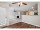 Living room with hardwood floors is connected to the kitchen and has access to the outside at 1386 Walnut Hill Dr, Rock Hill, SC 29732