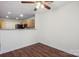 Living room with hardwood floors connected to the kitchen with stainless steel appliances at 1386 Walnut Hill Dr, Rock Hill, SC 29732