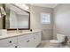 Bathroom featuring white vanity, modern fixtures, and neutral color palette at 145 Milford Cir, Mooresville, NC 28117