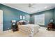 Comfortable bedroom with bright natural light and modern ceiling fan at 145 Milford Cir, Mooresville, NC 28117