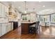 Gourmet kitchen with custom cabinetry, center island, stainless steel appliances, and a breakfast nook at 145 Milford Cir, Mooresville, NC 28117