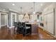 Gourmet kitchen with custom cabinets, granite countertops, stainless steel appliances, and a center island at 145 Milford Cir, Mooresville, NC 28117