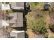 Birds eye view of a backyard featuring a patio area and lush greenery surrounding the space at 18016 Bluff Inlet Rd, Cornelius, NC 28031