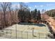 A picturesque aerial view of a sports court featuring basketball and other sport play areas at 18016 Bluff Inlet Rd, Cornelius, NC 28031