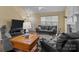 Spacious living room with hardwood flooring and ample seating at 18016 Bluff Inlet Rd, Cornelius, NC 28031